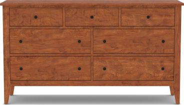 A handcrafted solid cherry wood dresser with seven dovetail-joined drawers, designed for durability and timeless elegance.