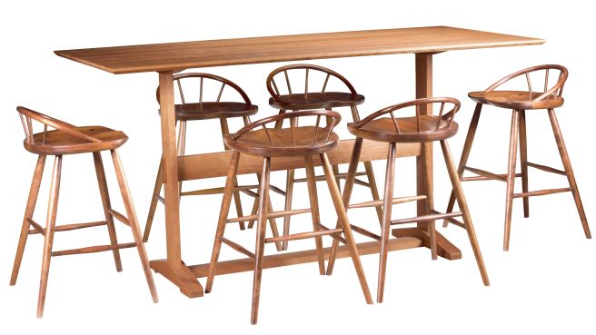 Pub-height table set with spindle-back chairs, crafted in solid wood for a modern yet rustic dining or bar seating experience.