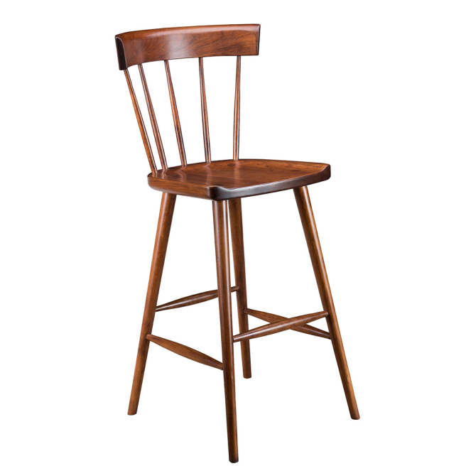 A timeless solid cherry wood bar chair with a curved backrest and sturdy tapered legs, designed for comfort and long-lasting quality.