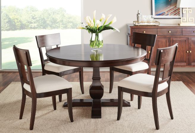 real wood dining room set with a dark stain
