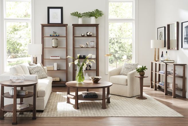 Made from solid wood, this elegant piece adds a touch of Craftsman-style simplicity to any space. Add this timeless, solid-wood, handmade drink table to your home decor.