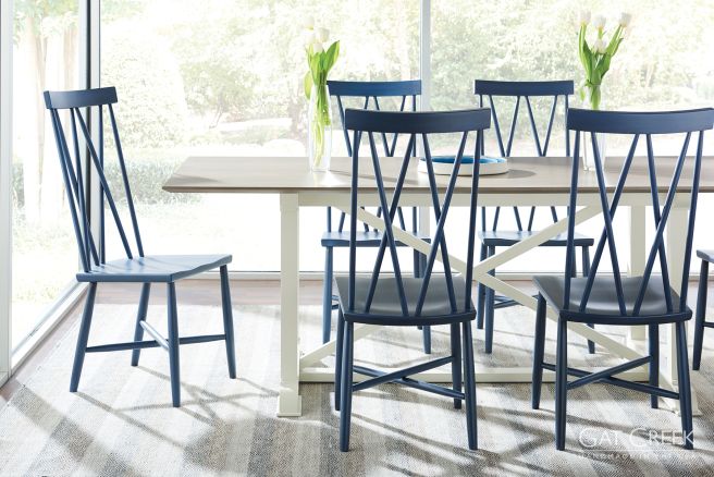 Appalachian Hardwood dining room with wooden chairs painted blue
