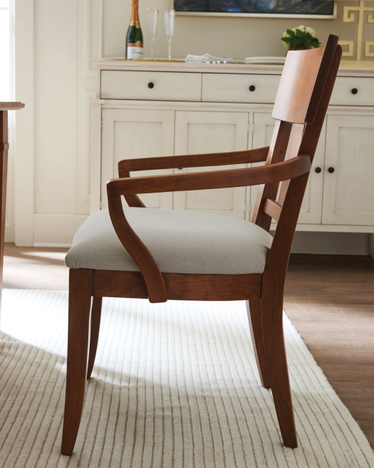 Wooden chair with upholstered seat